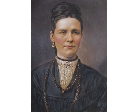 A late 19th century hand-coloured photographic portrait of an unknown woman, 17" x 13", in gilt frame 