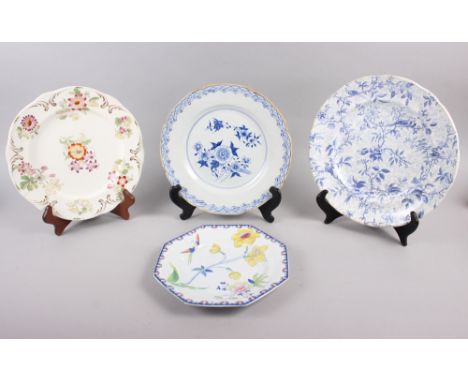 A Rockingham china floral decorated and gilt plate, two Brameld blue and white floral decorated plates and a similar Brameld 