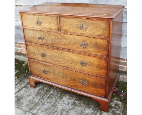 A 19th century mahogany chest of two short and three long graduated drawers with pierced handle back plates, on bracket feet,