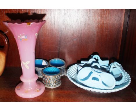 Five pieces of Sowerby pressed glass, a pair of salts and a pink coloured glass vase with floral decoration 