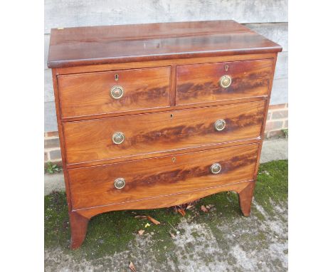 A mahogany chest of two short and two long drawers, on bracket feet, 35" wide x 18" deep x 35" high 