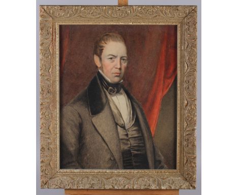 A 19th century watercolour study, portrait of an unknown gentleman, 15 1/4" x 12 1/2", in gilt frame and an oval pastel portr