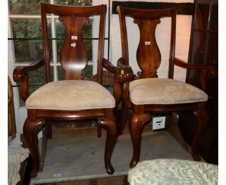 A set of eight Queen Anne design dining chairs with plain vase splats and stuffed over seats, on cabriole supports, and a mat