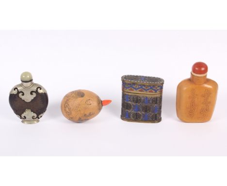 A Chinese cloisonne enamel oblong box and cover, a Chinese snuff bottle formed from a nut, decorated figures and script, and 