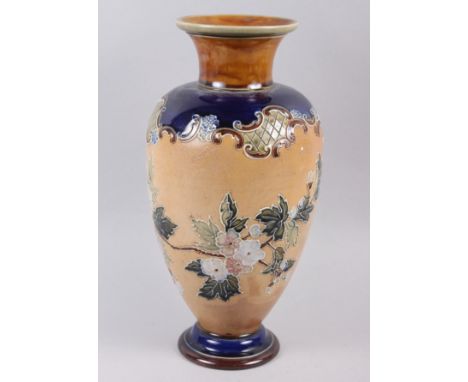 A Doulton Lambeth floral decorated baluster vase, 13 1/2" high Condition: Chip to underside of foot rim & small crack/firing 