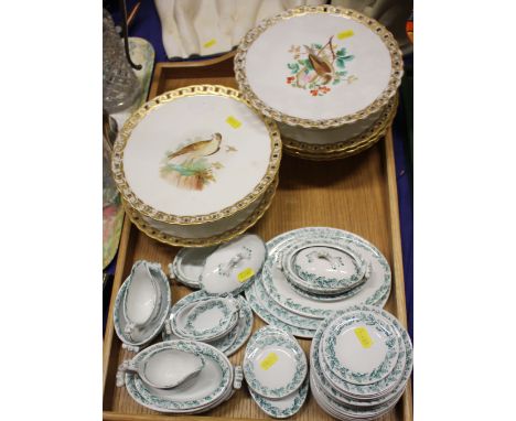 Four 19th century hand-painted tazzas, decorated birds, three matching plates and a miniature dinner service with green oak l