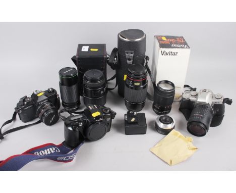 A Canon EOS 500 35mm camera, a Pentax MZ-5N SLR camera, a Centon SLR camera, three Pentax K bayonet zoom lenses, a flash gun 