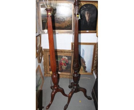 A mahogany standard lamp with turned fluted column and carved acanthus and wheat decoration, on cabriole claw supports, 60" h