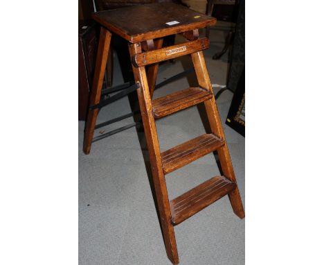 A Slingsby three-step step ladder, 28 1/4" high 