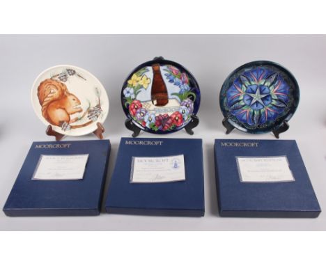 A Moorcroft edition Centennial plate and two Moorcroft year plates, 1995 and a 1996 boxed Condition: 1996 Plate crazing to ba