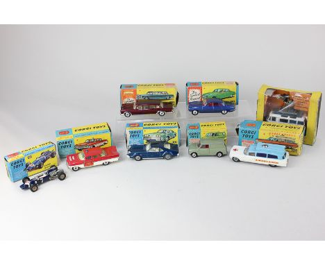 A collection of eight Corgi Toys die cast model toy cars including Commer Mobile Camera Van No 479, Chevrolet Fire Chief No 4