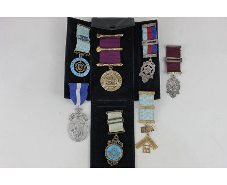 A 15ct gold Freemasonry medal, with ribbon marked 38, a 9ct gold Cyrus Chapter 38 medal, a Victorian silver Freemasonry medal