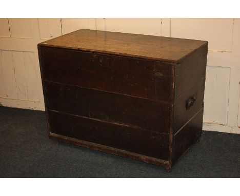 A George III rectangular oak trunk, of plain plank construction with moulded edge, later repairs, 102cm