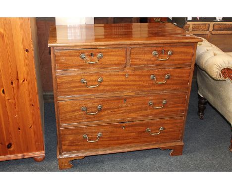 A mahogany chest of two short over three long drawers, with swan neck drop handles, on bracket feet (a/f), 87cm