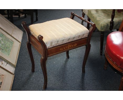 An inlaid Edwardian piano stool with rising box top on cabriole legs (a/f - one rail handle missing), 52cm