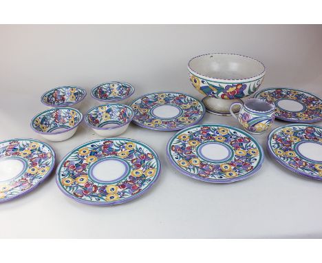 A collection of Carter Stabler Adams Poole pottery comprising a fruit bowl on flared pedestal stem, 21cm, six cake plates, 21