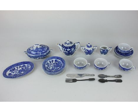 A 20th century Japanese porcelain doll's dinner and tea set in blue and white willow pattern, including teapot, oval tureen a