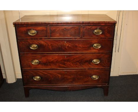 A 19th century mahogany chest of three short over three long graduated drawers, with brass oval drop handles, on bracket feet