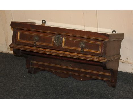 A Continental walnut rectangular wall shelf, glass topped, with drawer and hanging rail below, 52cm