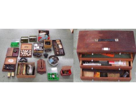 KWM bushing tool with accessories and instructions; also a large quantity of brass bushes for repair for watches and clocks, 