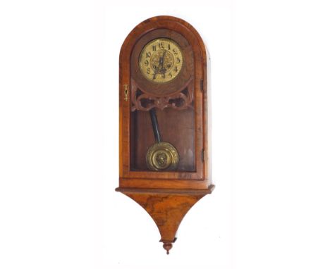 Figured walnut two train wall clock striking on a gong, the 6" brass dial within a rounded arched glazed case 30.5" high (pen