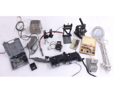 Quantity of tools from a watchmakers workshop to include a microscope, two UV lights, lamp etc