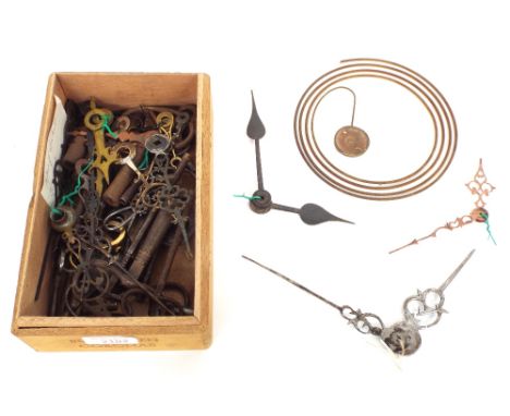 Twelve pairs of clock hands, thirty-one clock winding keys, two pendulums and a gong