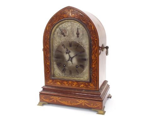 Mahogany inlaid two train lancet bracket clock, the W &amp; H movement striking on two gongs, the 6.5" silvered arched dial w