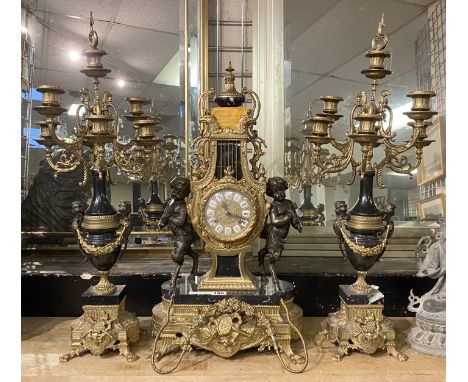 GILT FRENCH MOVEMENT CHERUB CLOCK &amp; CANDELABRA (CLOCK 61CMS (H) APPROX