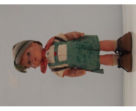 M J Hummel Peterle Boy Doll in German "Lederhosen" costume. With original lables and tags. Circa 1950s 28cm
