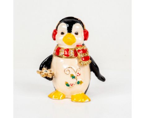 Featuring weighted material with hinged lid and magnetic closure. Details include ear muffs with gilding effect and scarf wit