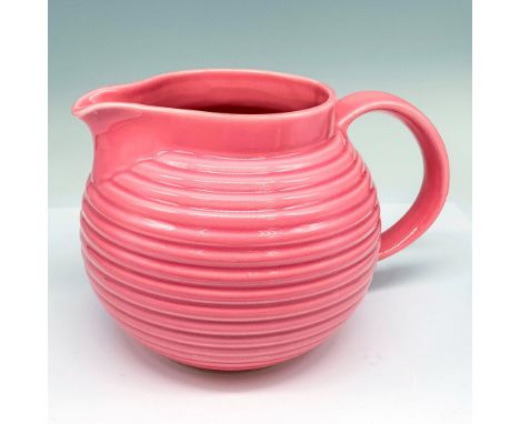 Pretty beehive pitcher with ribbed design. Fapor stamp on bottom. Dimensions: 10"L x 6.5"W x 6.5"HManufacturer: FaporCountry 