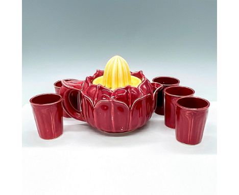 Cute set of five small glasses and pitcher with reamer lid in the shape of a flower. Lid is bright yellow with the pitcher bo