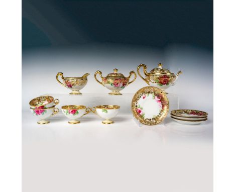 This tea set with Jewels is a stunning collection designed with intricate hand-painted details, including gorgeous jewels, go