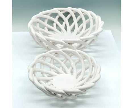 A pair of white ceramic breadbaskets that are designed with a woven lattice pattern. Braid Bread Basket backstamp. Dimensions
