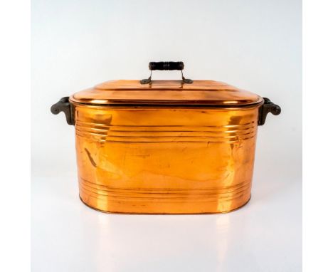 This gorgeous vintage pot is a collectible that brings a touch of nostalgia and rustic charm. Crafted from copper, this basin