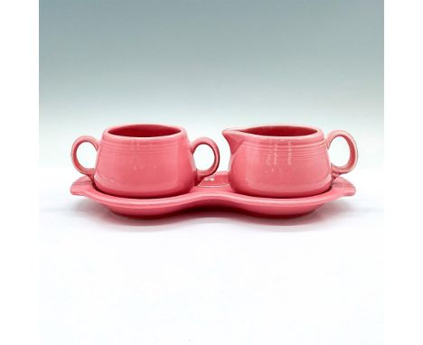 A ceramic pink tableware set consisting a tray with sugar bowl and creamer. HLC Fiesta impressed stamped on the bases. Tray: 