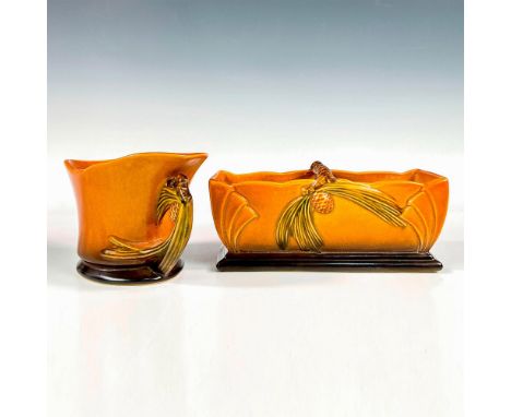 Beautiful set decorated in the style of Roseville's Pinecone pattern , featuring small ovoid cones with long irregular needle