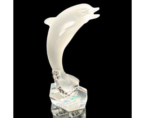 Frosted crystal dolphin on clear waves and six sided base. Goebel mark and sticker on bottom. Dimensions: 2.25"L x 1.5"W x 5.