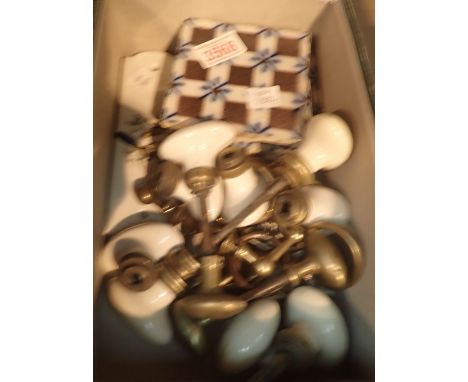 Collection of French ceramic door handles, ceramic tiles and antique brass curtain rings