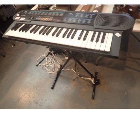 Casio electric organ with stand