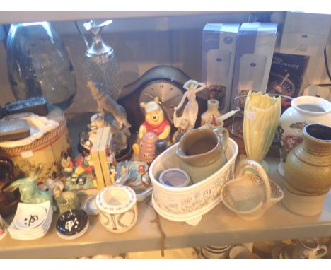 Shelf of mixed items including tins, wine jug, clock, pictures, ceramics etc