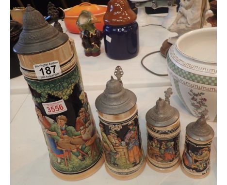 Collection of four German ceramic steins