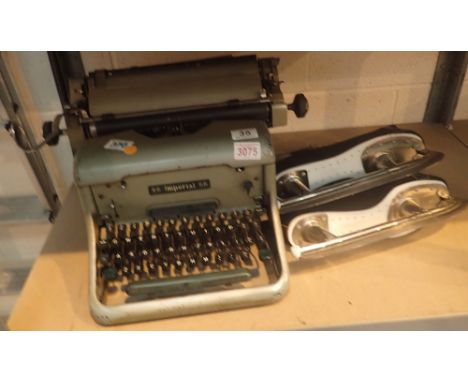Pair of Bauer ice skates, size 11 1/2 and an Imperial model 66 typewriter