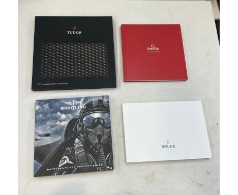 Selection of luxury watch catalogues to include Rolex 2014-2015, Breitling, Tudor Watch Your Style and Omega The Collection 