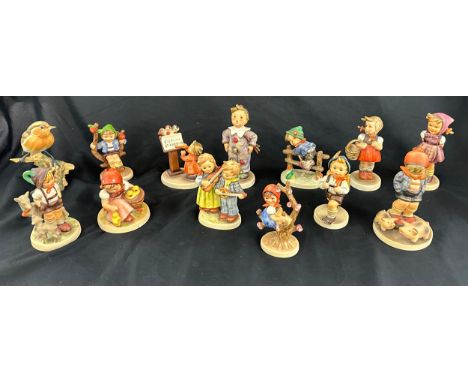 Selection of vintage Goebel figures and one Capidmonte bird figure 