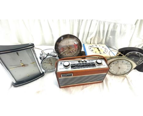 Selection vintage mantel clocks to include various Smiths designs including a hunting scene, vintage radio, all untested 