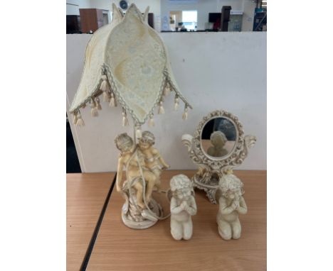 Table lamp depicting ladies, 2 cherubs and a cherub design table top mirror, overall height of lamp with shade is 29 inches 