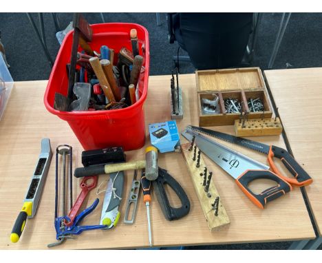 Selection of tools includes saws, hammers, drill bits etc 