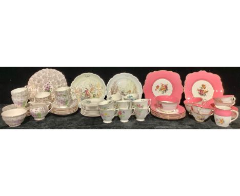 A Foley China tea service for six, decorated with flowers within a broad pink border, comprising cake plates, side plates, cr